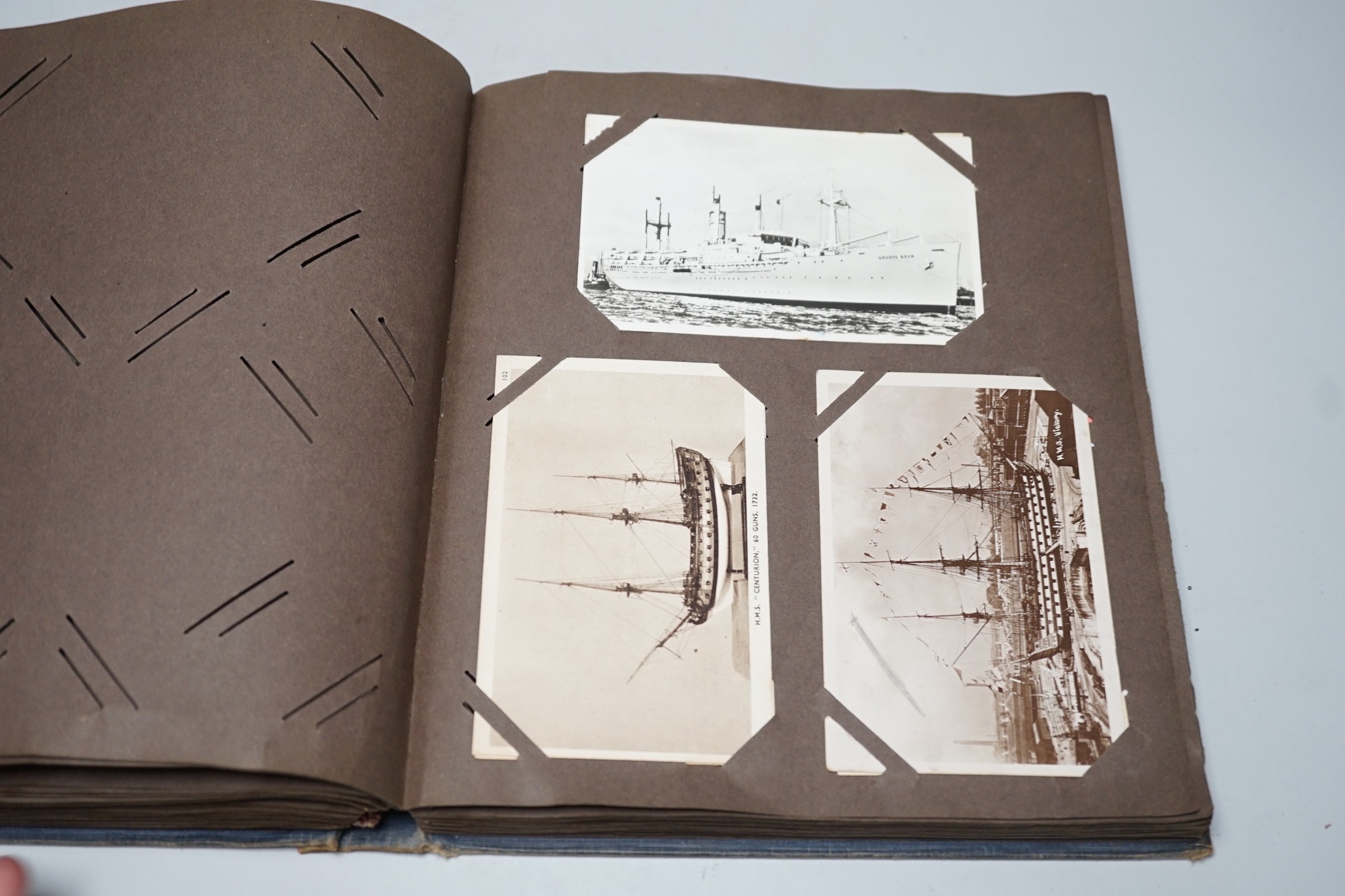 Two albums of topographical postcards